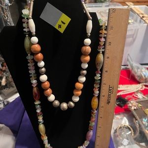 2 necklaces in brown tones